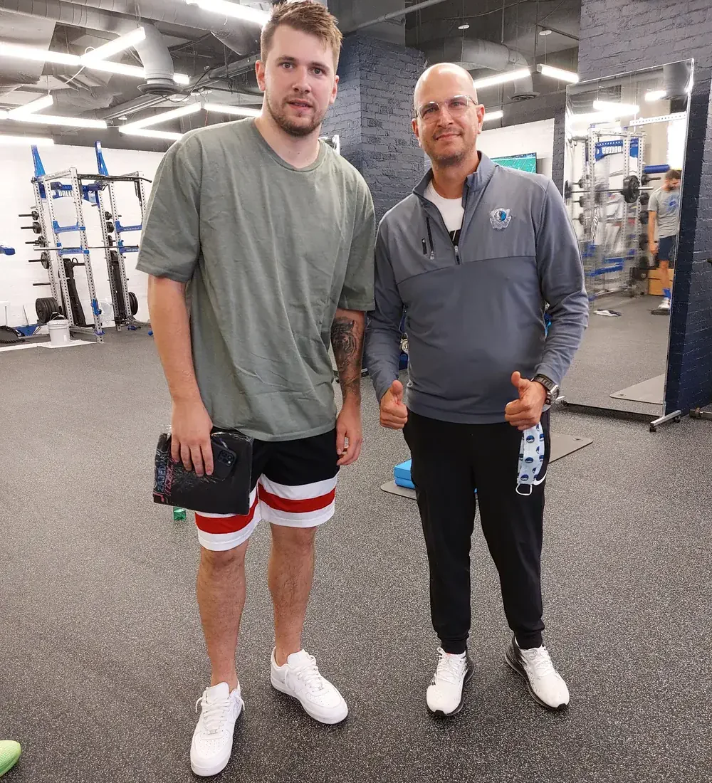 Luka Dončić with Tamir Kfir at the Dallas Mavericks practice facility